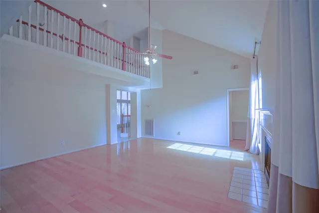 a view of a kitchen with a sink cabinets and stainless steel appliances