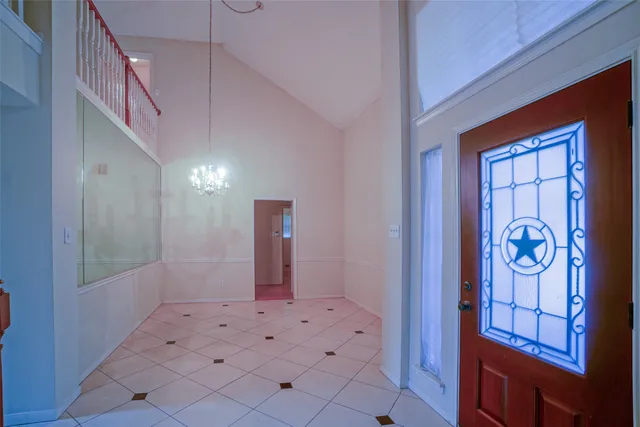 a view of a hallway with entryway