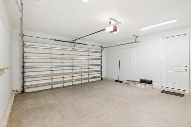 a view of a room with toys and flat screen tv