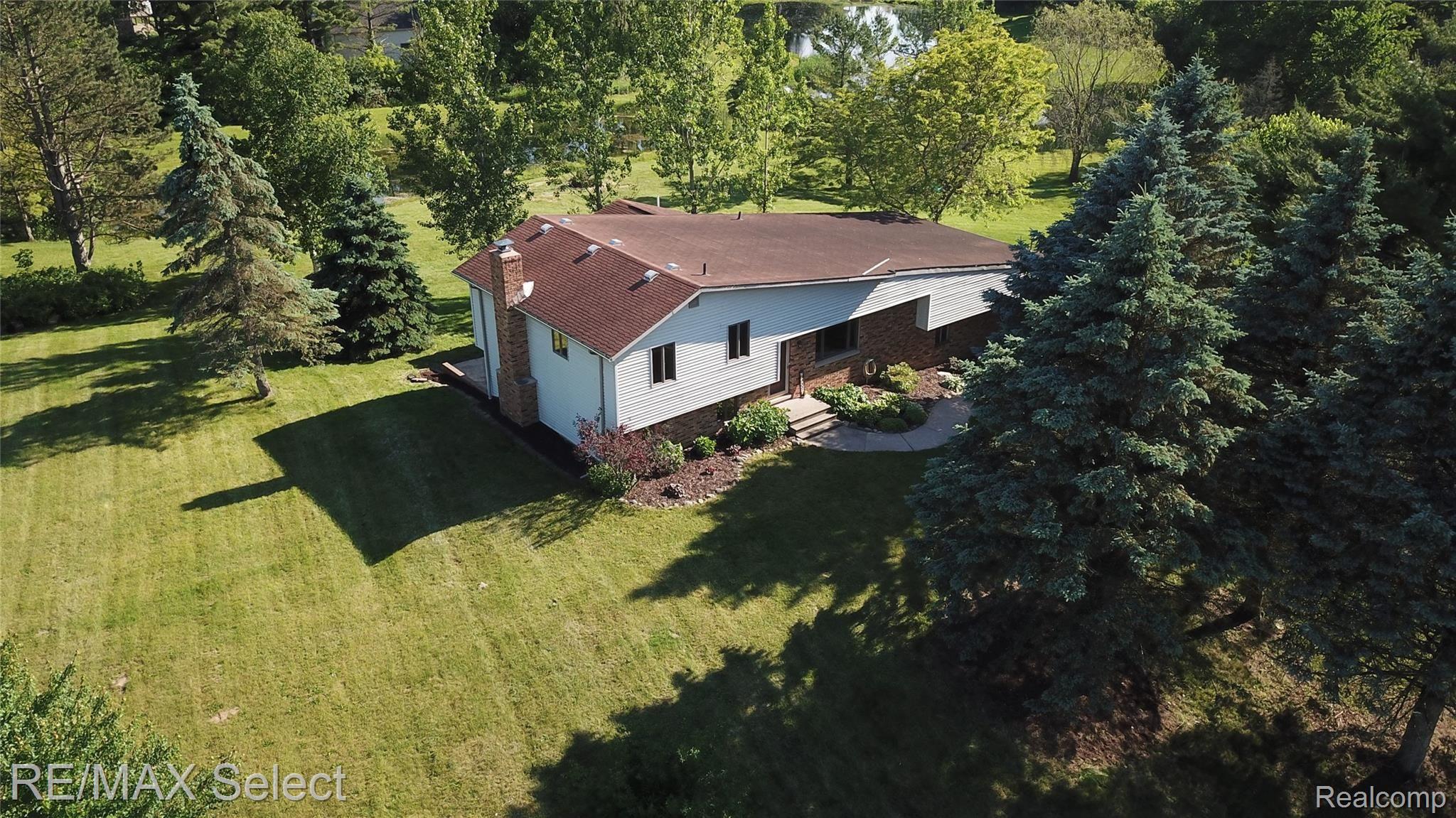 8304 East Baldwin Road Goodrich, MI 48438 - Photo 1 of 32 front.jpg