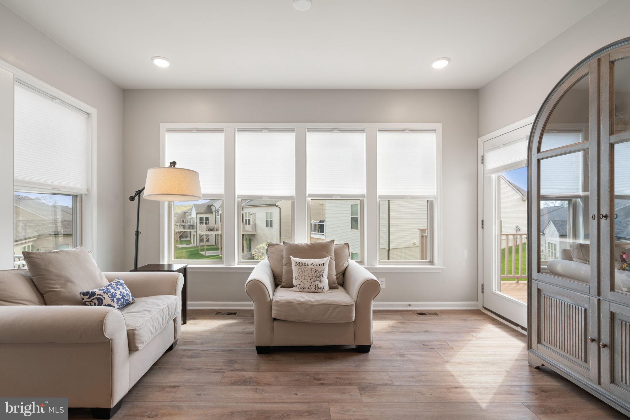 15795 Gardenia Rdg Way Haymarket, VA 20169 - Photo 11 of 63 a living room with furniture and a large window