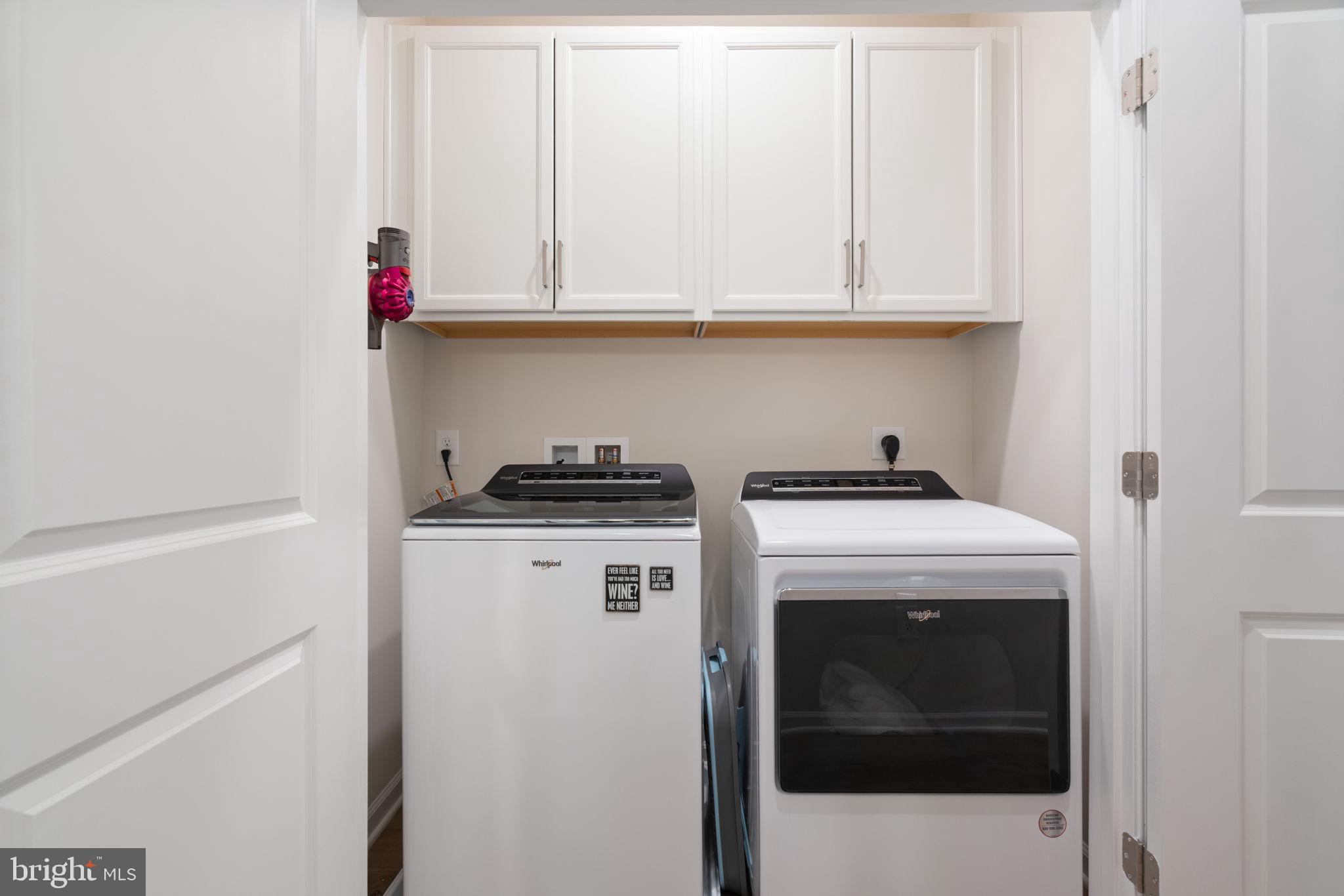15795 Gardenia Rdg Way Haymarket, VA 20169 - Photo 13 of 63 a utility room with dryer and washer