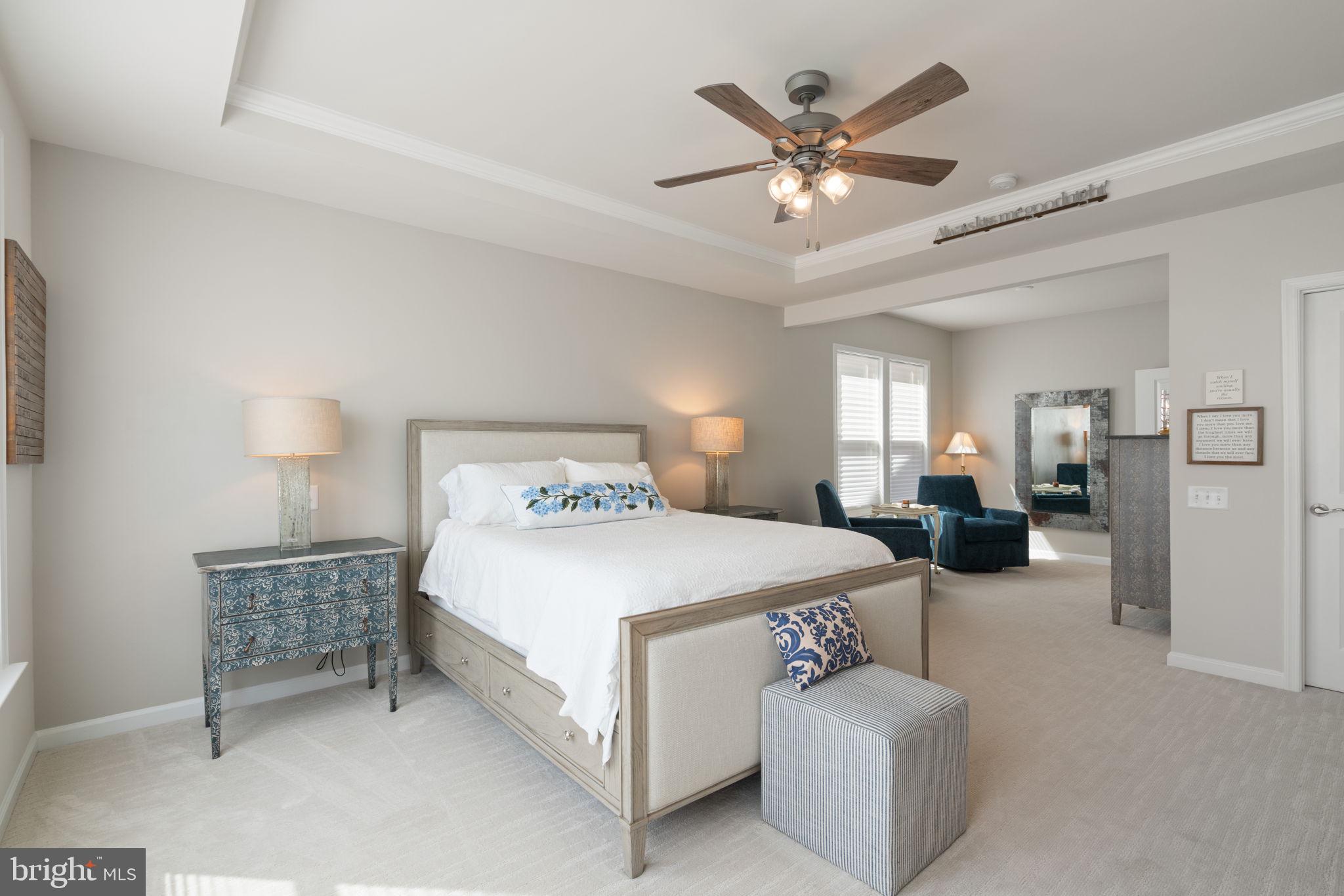 15795 Gardenia Rdg Way Haymarket, VA 20169 - Photo 15 of 63 a bedroom with a bed and ceiling fan