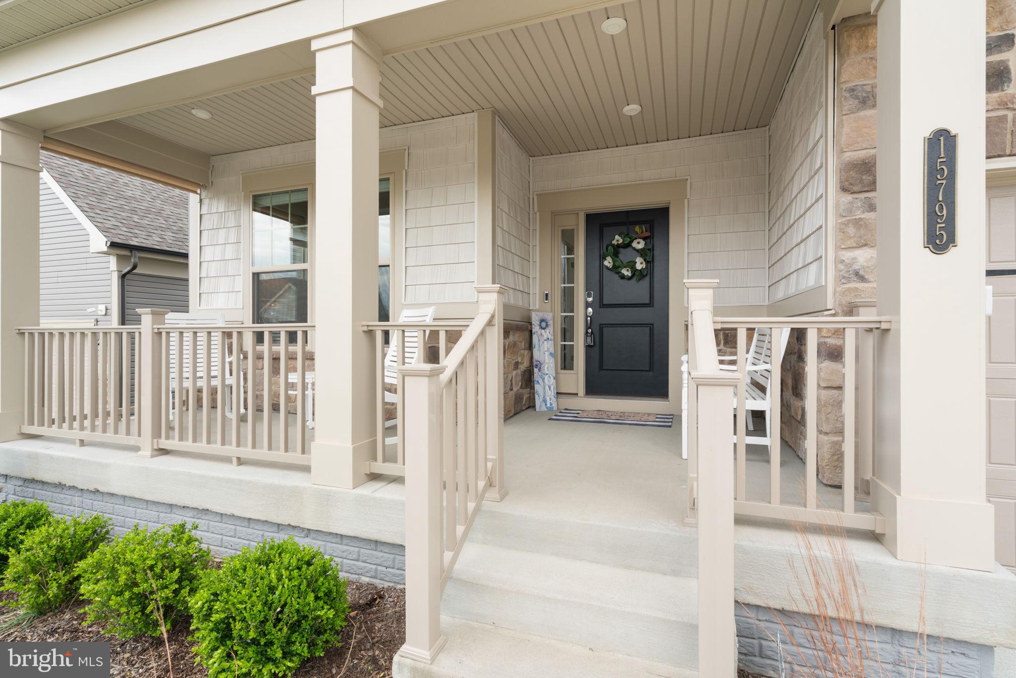 15795 Gardenia Rdg Way Haymarket, VA 20169 - Photo 2 of 63 a front view of a house with a porch
