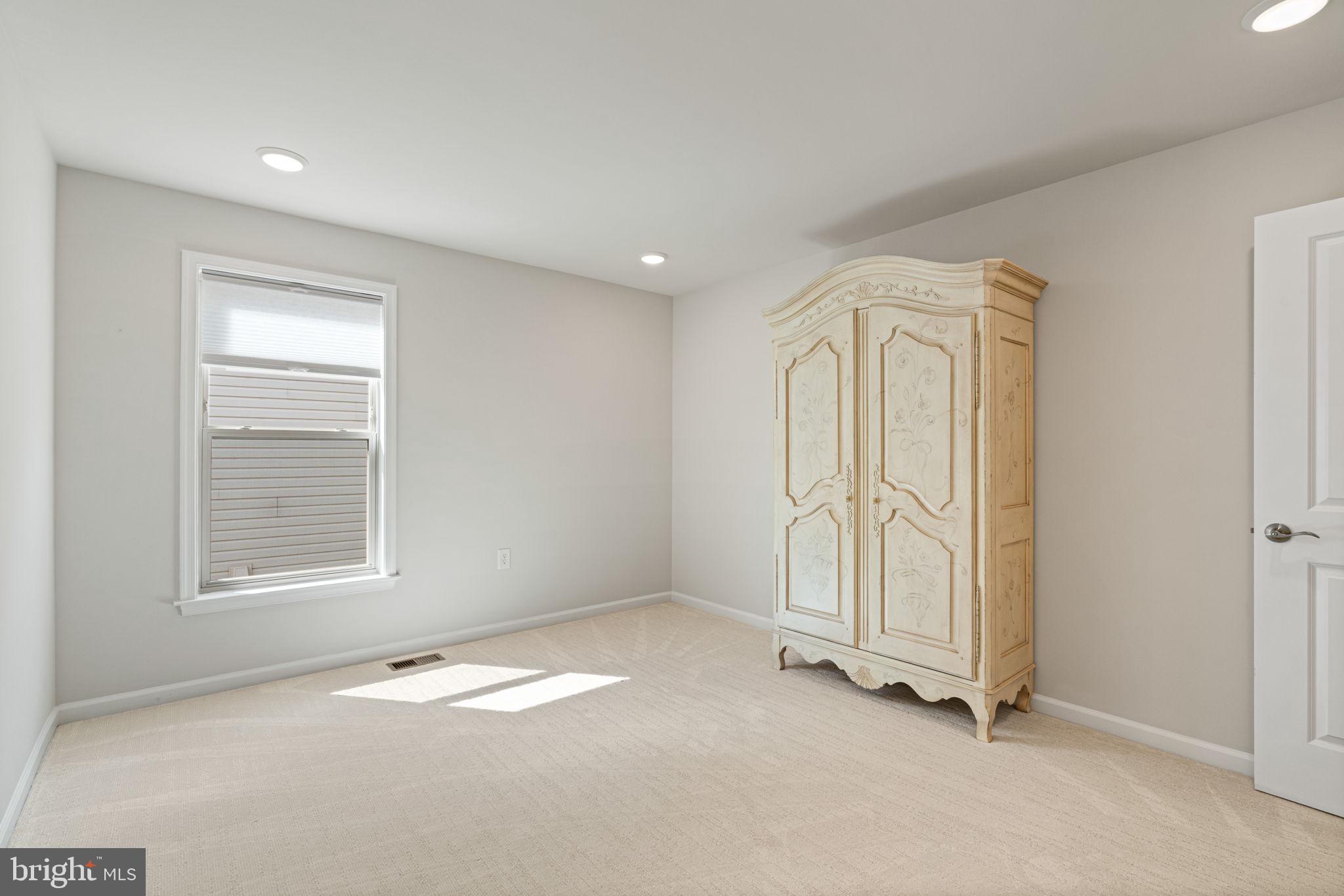 15795 Gardenia Rdg Way Haymarket, VA 20169 - Photo 26 of 63 an empty room with a empty space and window