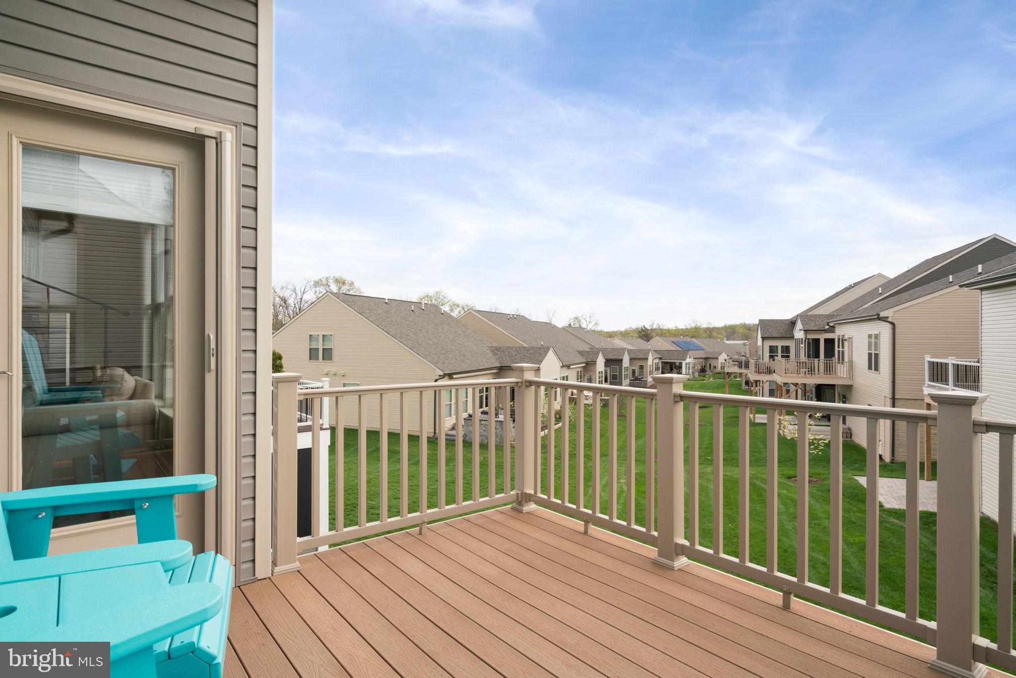 15795 Gardenia Rdg Way Haymarket, VA 20169 - Photo 36 of 63 a view of a balcony with lake view and wooden floor