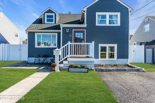 a house view with a garden space