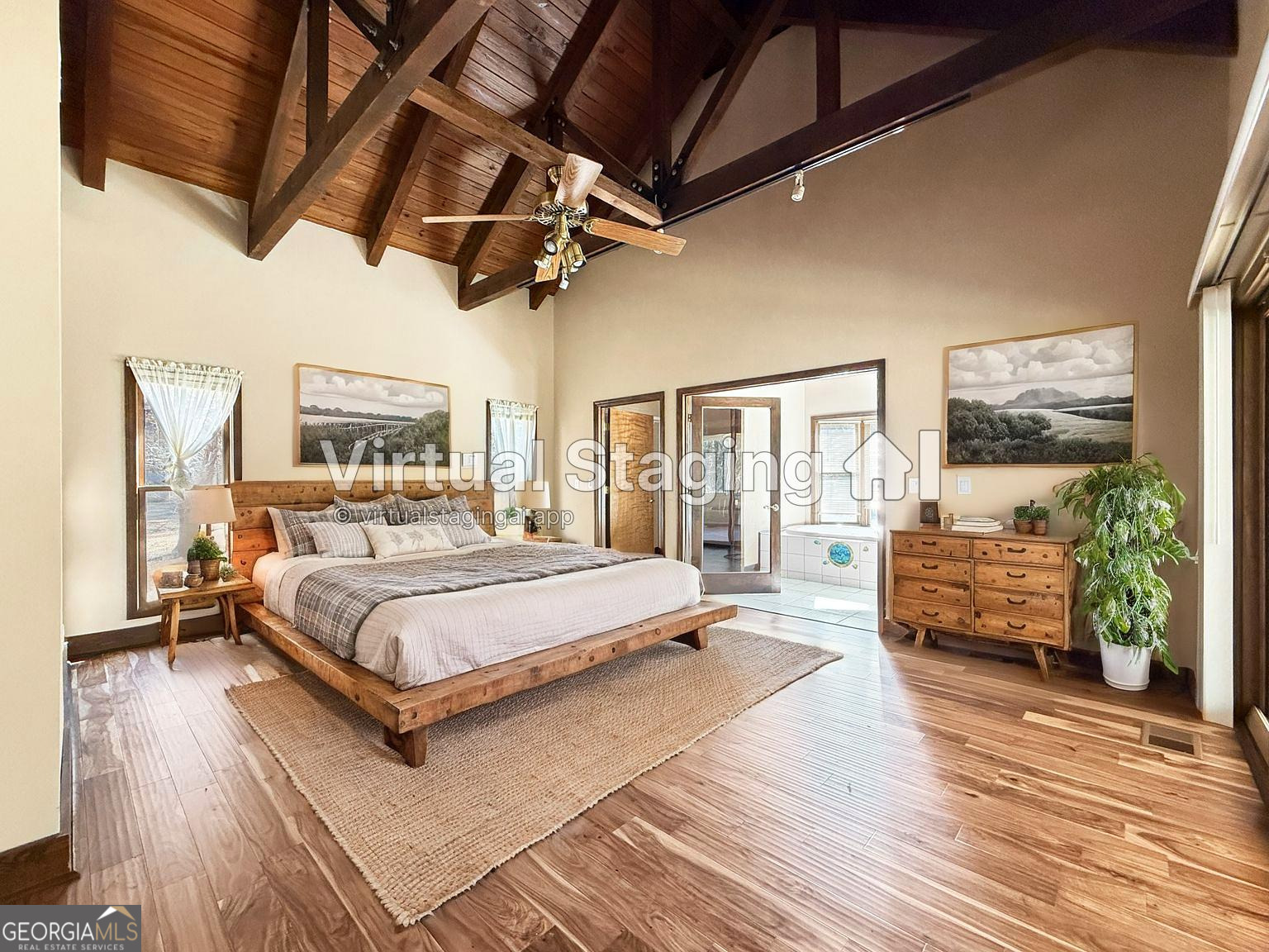 1140 Highway 54 Moreland, GA 30259 - Photo 17 of 39 a spacious bedroom with a balcony a bed and a couch