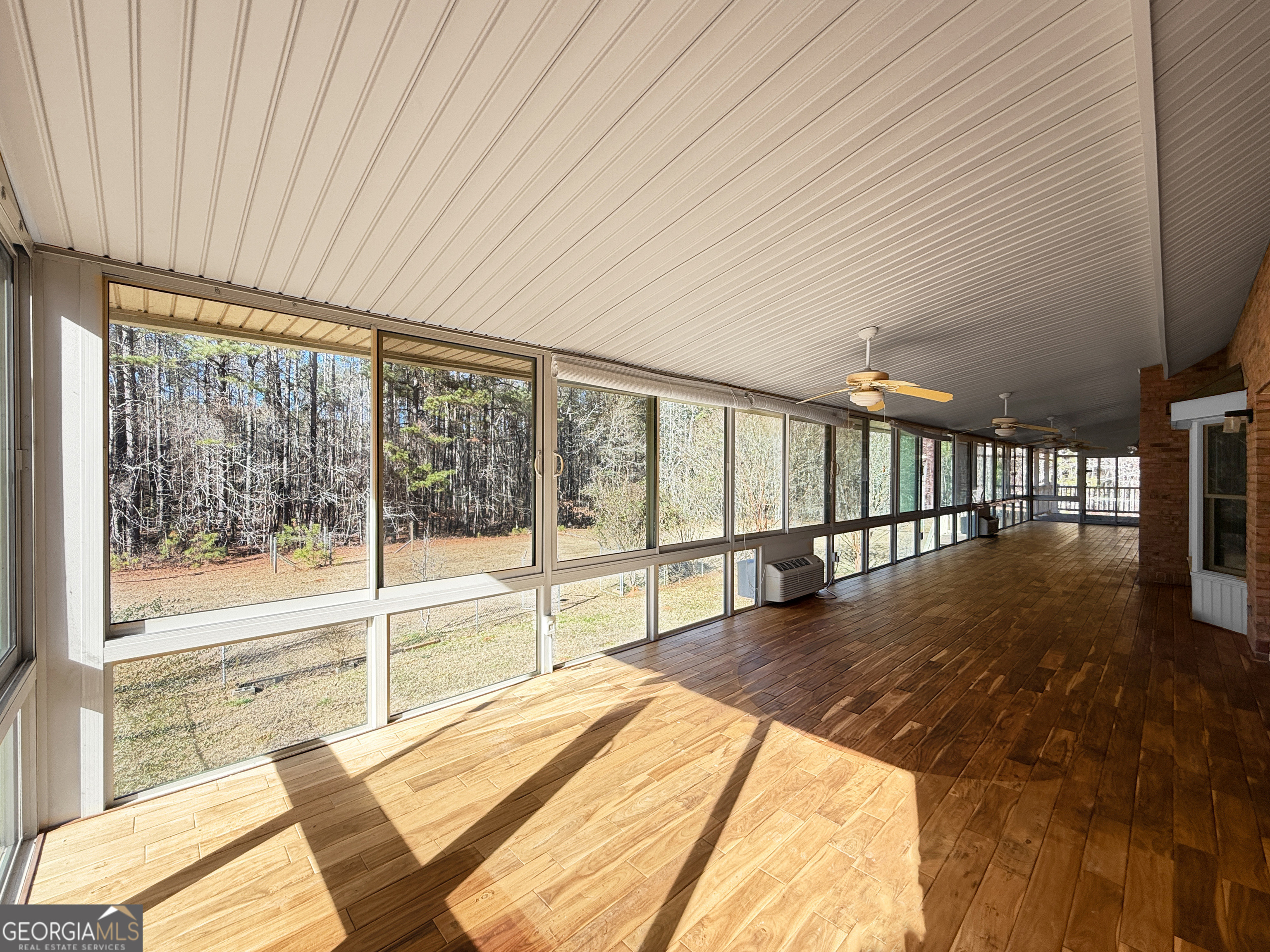 1140 Highway 54 Moreland, GA 30259 - Photo 19 of 39 a view of a living room hardwood floor and staircase