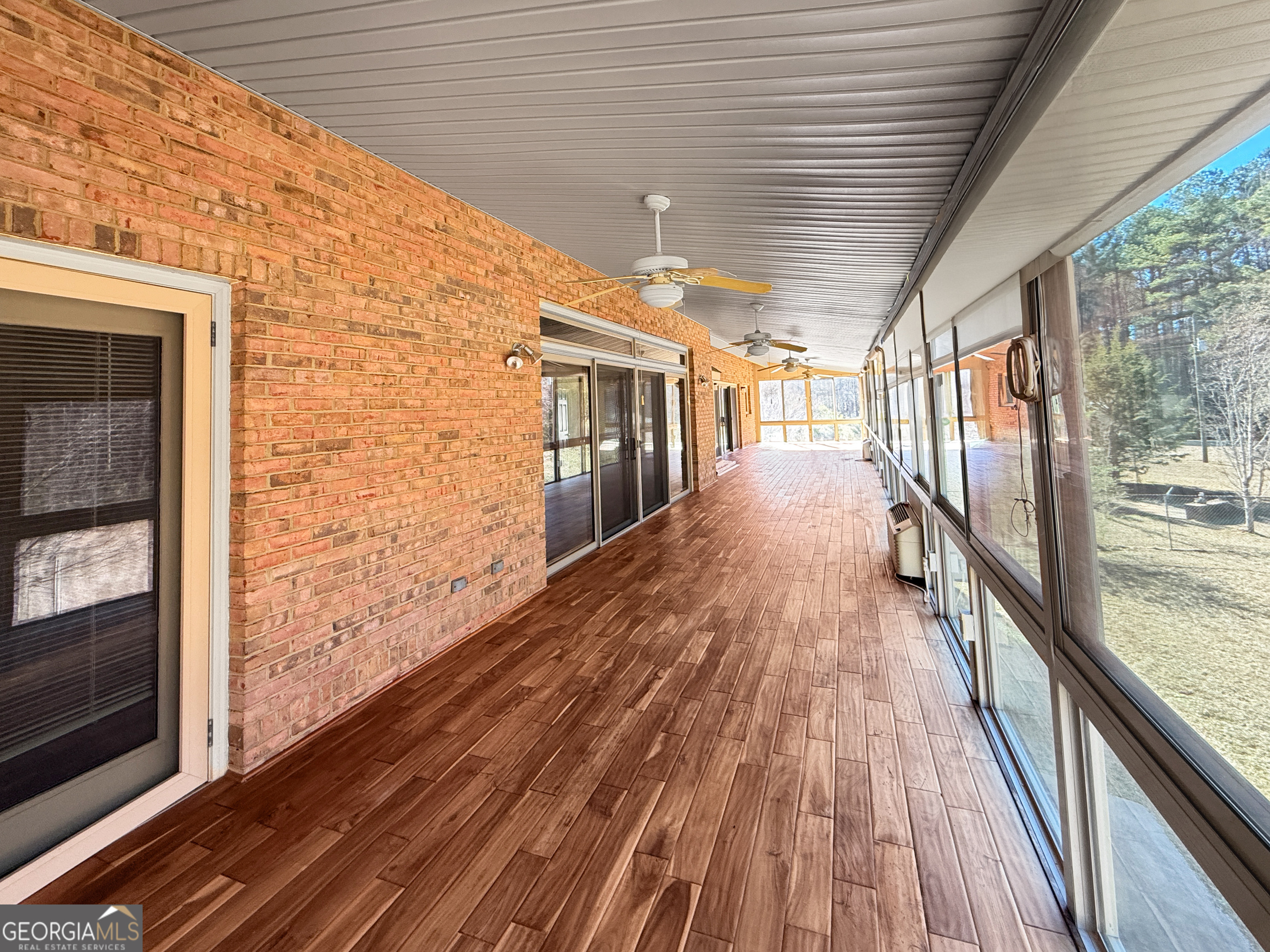 1140 Highway 54 Moreland, GA 30259 - Photo 20 of 39 a view of balcony with wooden floor