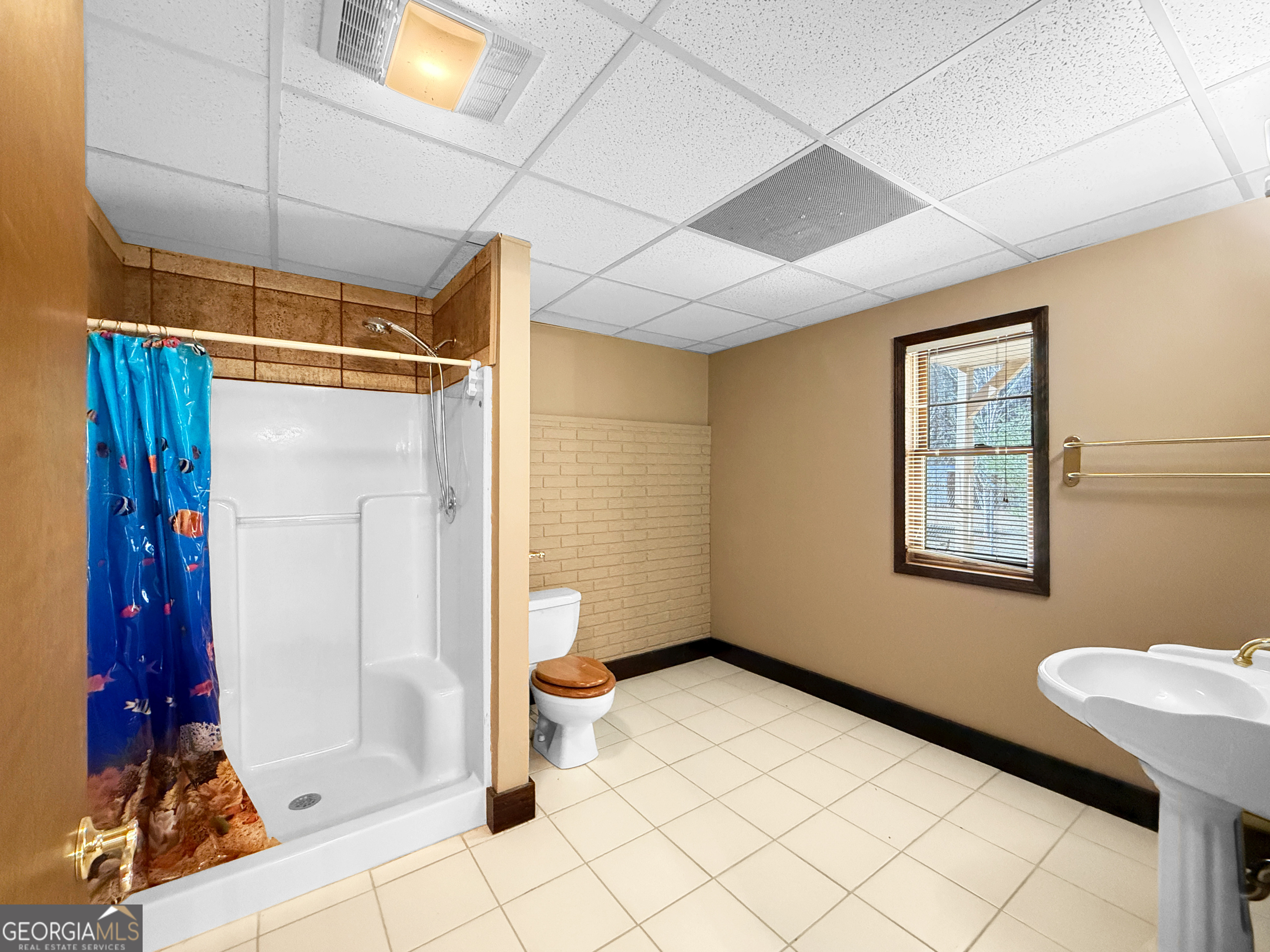 1140 Highway 54 Moreland, GA 30259 - Photo 29 of 39 a view of entryway with bathroom and shower