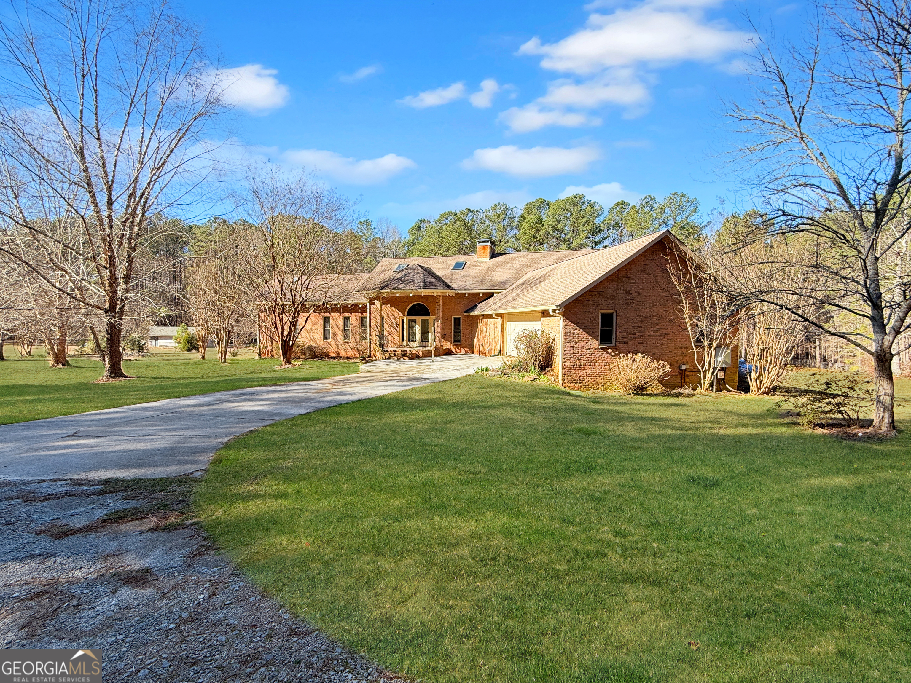 1140 Highway 54 Moreland, GA 30259 - Photo 3 of 39 a view of a house with a big yard