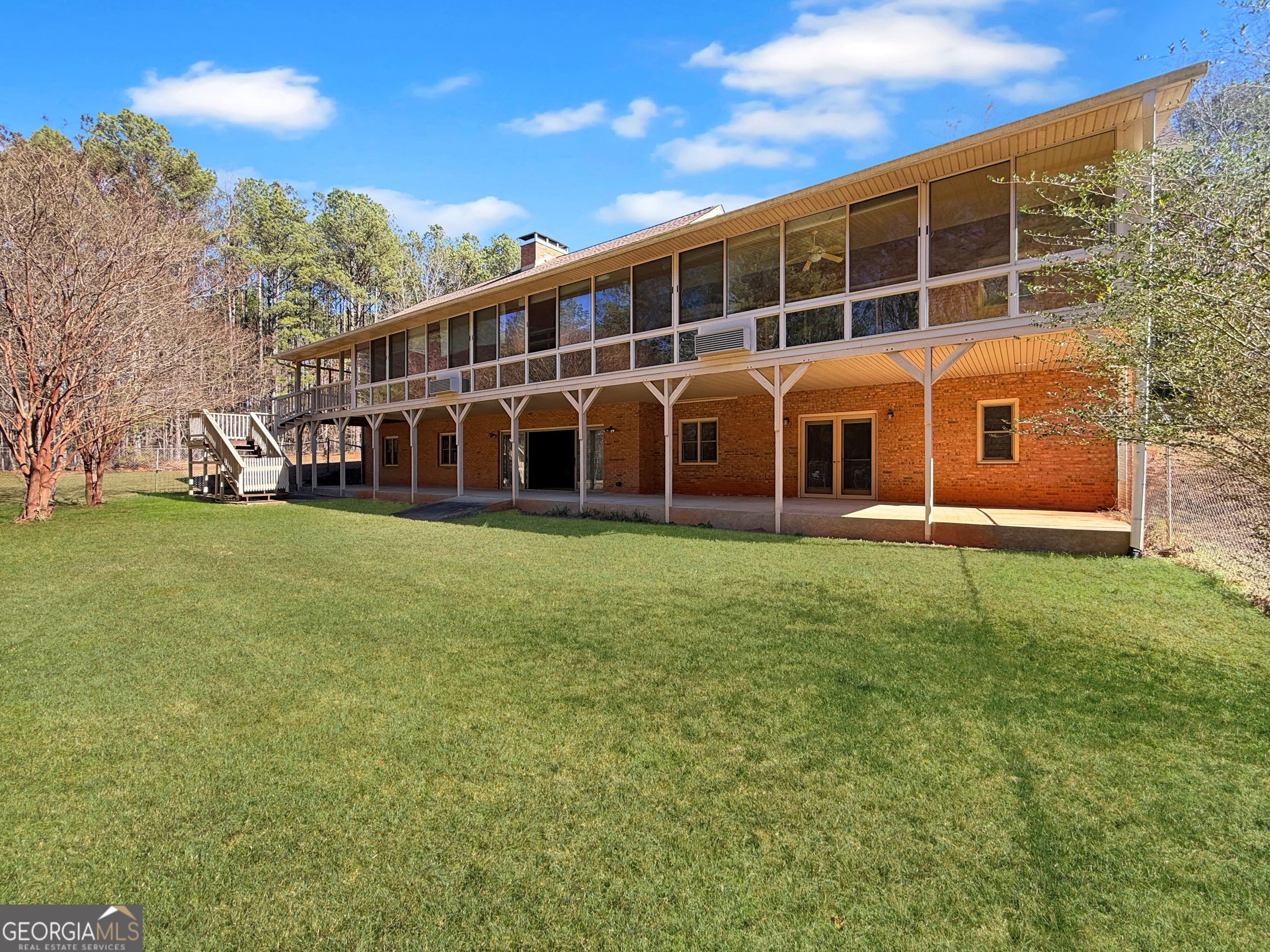 1140 Highway 54 Moreland, GA 30259 - Photo 31 of 39 a view of a house with backyard and porch
