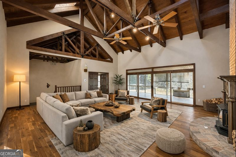 1140 Highway 54 Moreland, GA 30259 - Photo 5 of 39 a living room with furniture and a floor to ceiling window