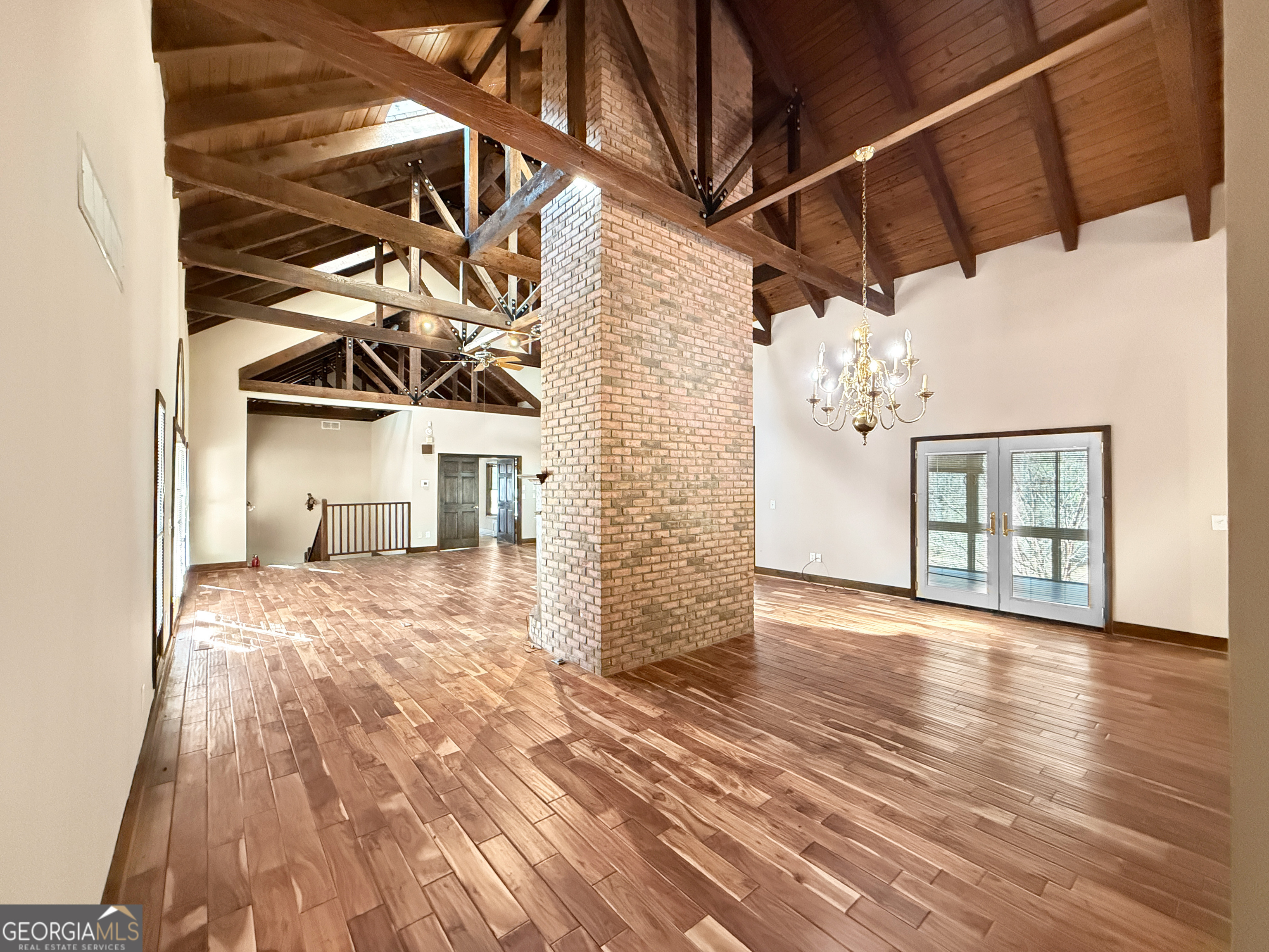 1140 Highway 54 Moreland, GA 30259 - Photo 8 of 39 a view of a room with wooden floor and windows