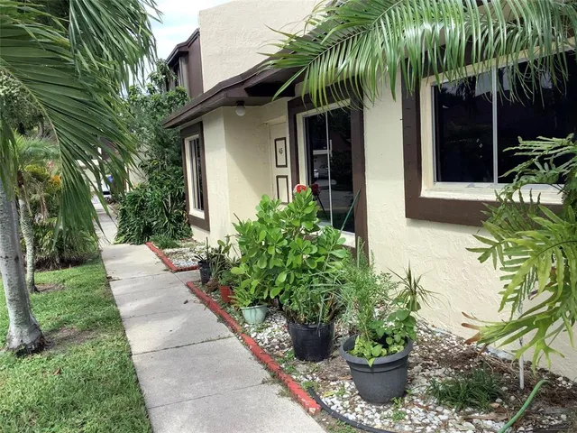 a front view of a house with garage