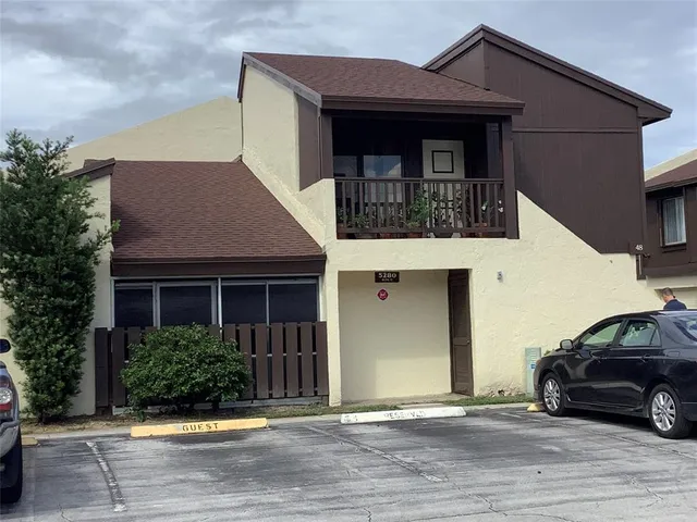 a house view with a garden space