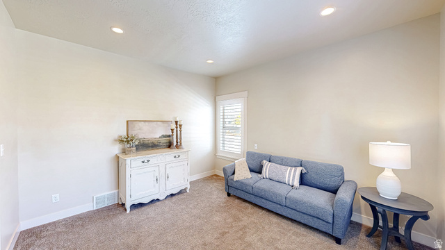 368 East 700 North Springville, UT 84663 - Photo 8 of 55 Sitting room with light carpet and recessed lighting