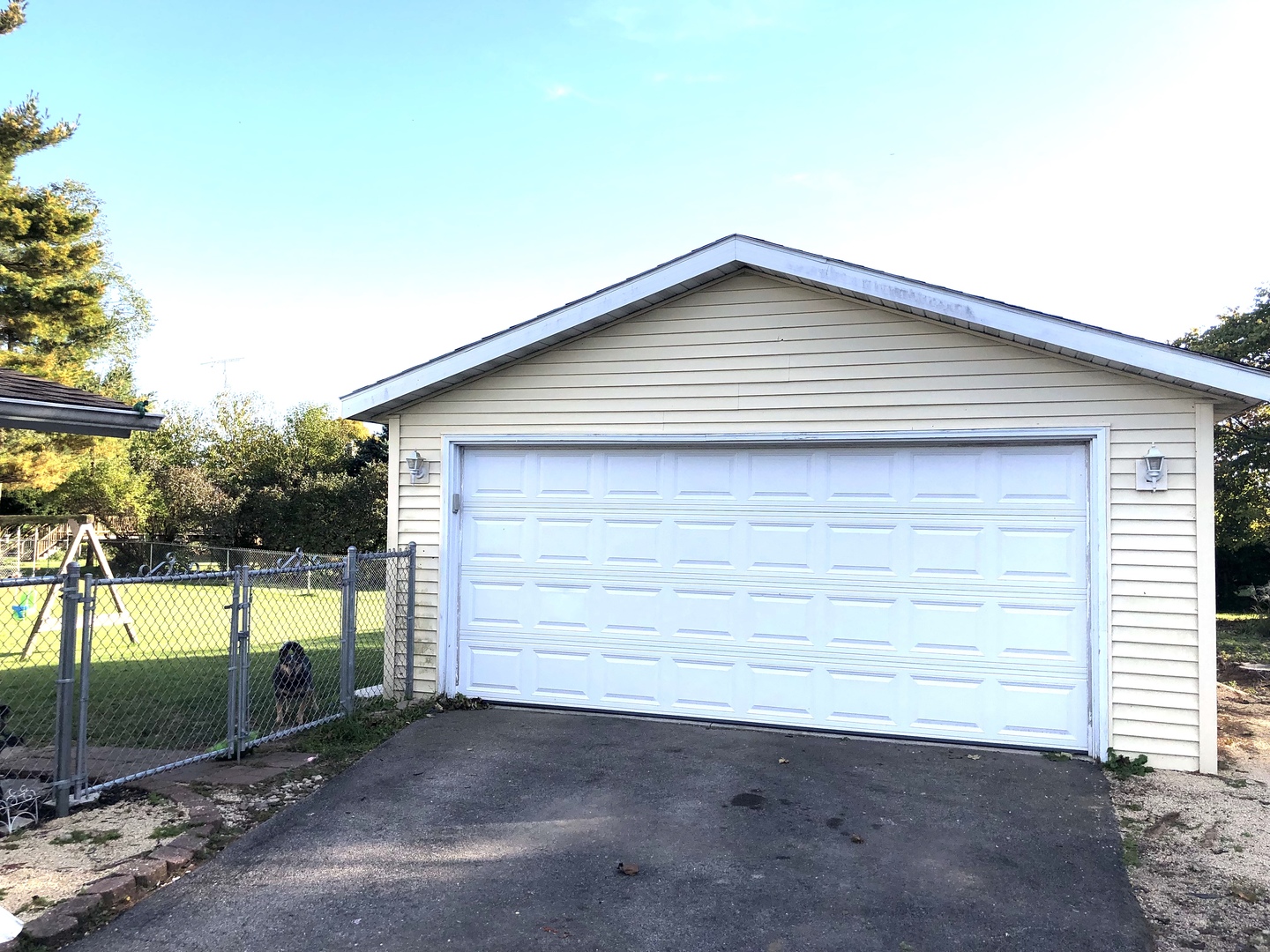 348 Swanson Road Sycamore, IL 60178 - Photo 3 of 20 a small white house with a outdoor space