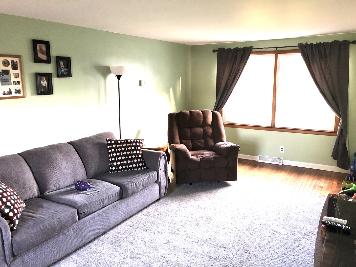 348 Swanson Road Sycamore, IL 60178 - Photo 5 of 20 a living room with furniture and a large window