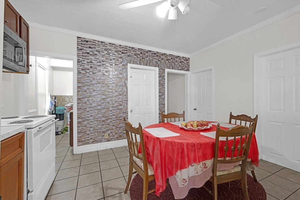 29 Whitcomb Street Webster, MA 01570 - Photo 12 of 17 a dining room with furniture and chandelier