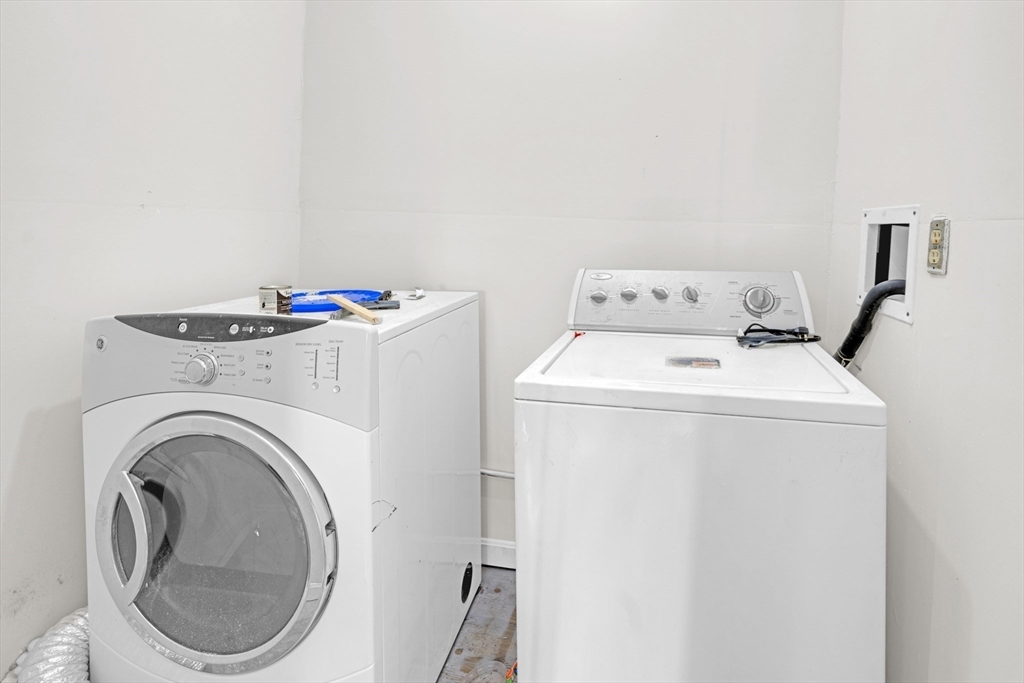 29 Whitcomb Street Webster, MA 01570 - Photo 17 of 17 a utility room with dryer and washer