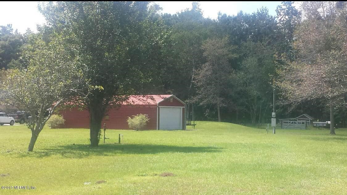 54489 Vikki Road Callahan, FL 32011 - Photo 1 of 1 a view of a back yard
