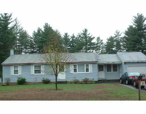 404 Southampton Road Holyoke, MA 01040 - Photo 1 of 1 a front view of a house with a yard