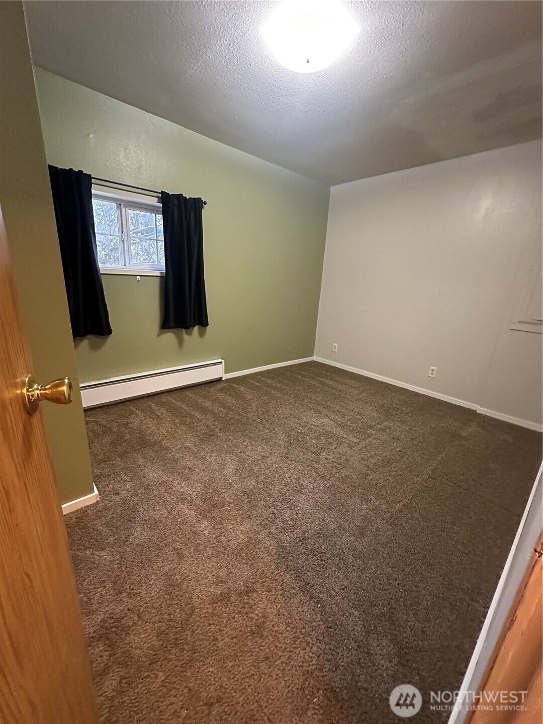 101 Walter Road Winlock, WA 98596 - Photo 11 of 25 an empty room with windows