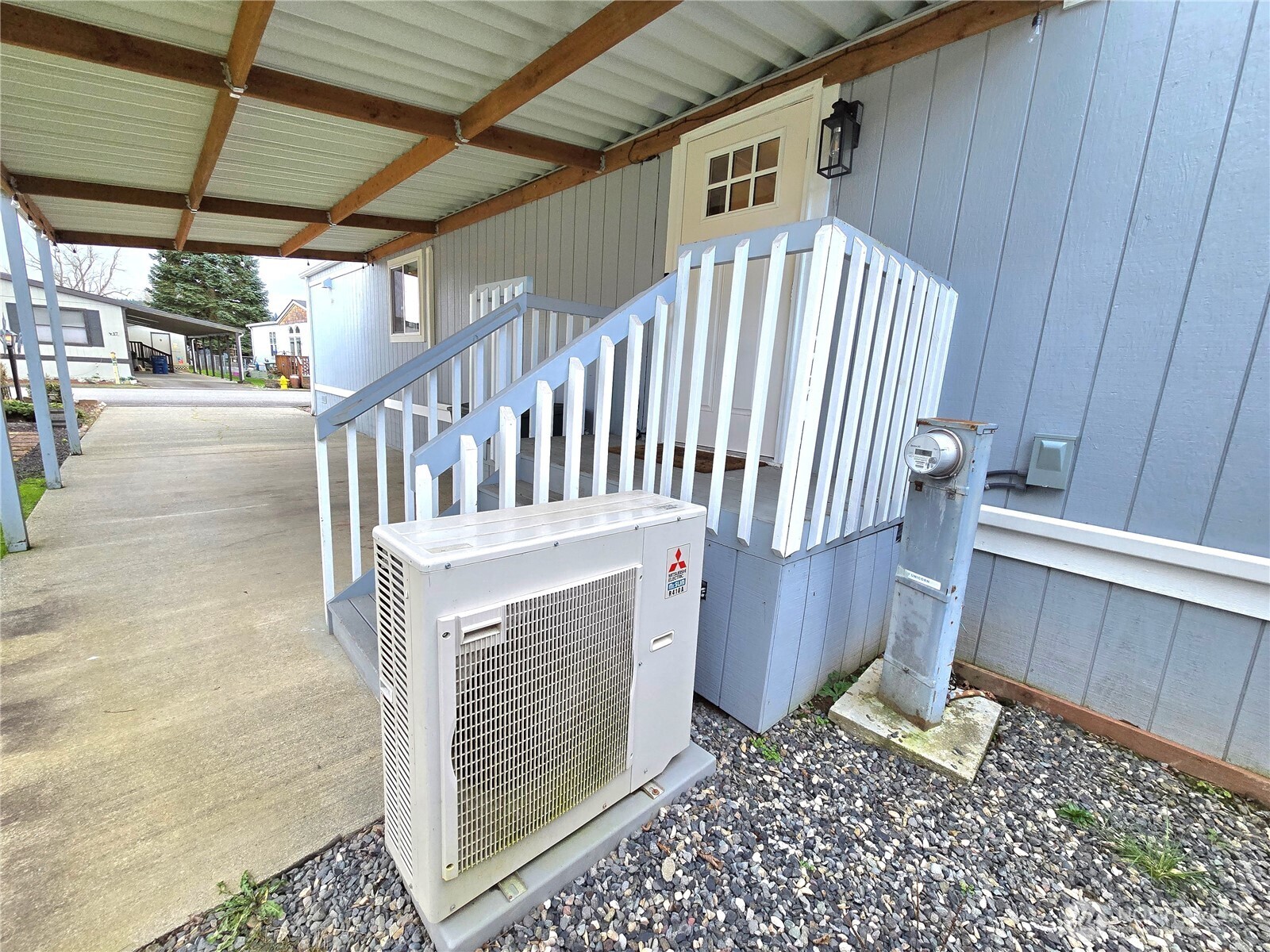 212 Old Owen Road, Unit 43 Sultan, WA 98294 - Photo 18 of 19 a view of a porch with a bench