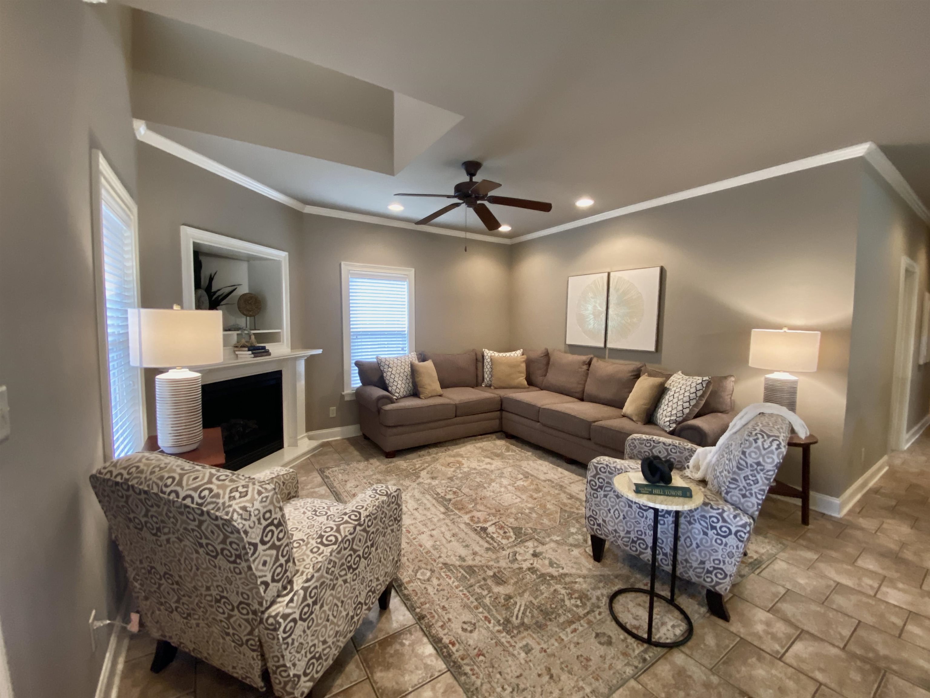 23 Mountain View Iuka, MS 38852 - Photo 13 of 31 a living room with furniture and a chandelier