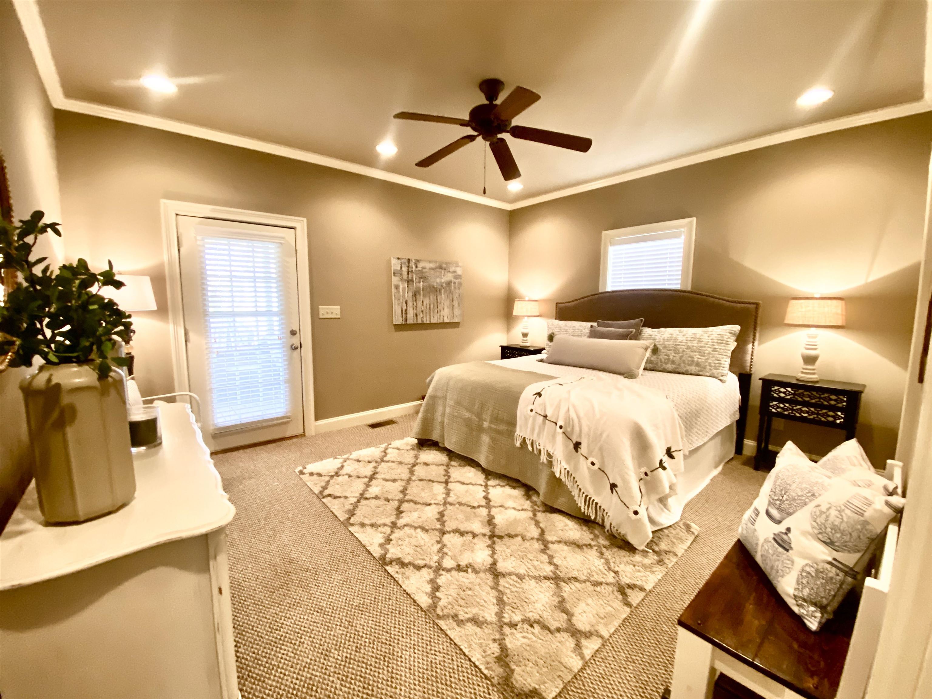 23 Mountain View Iuka, MS 38852 - Photo 19 of 31 a bedroom with a bed and a couch