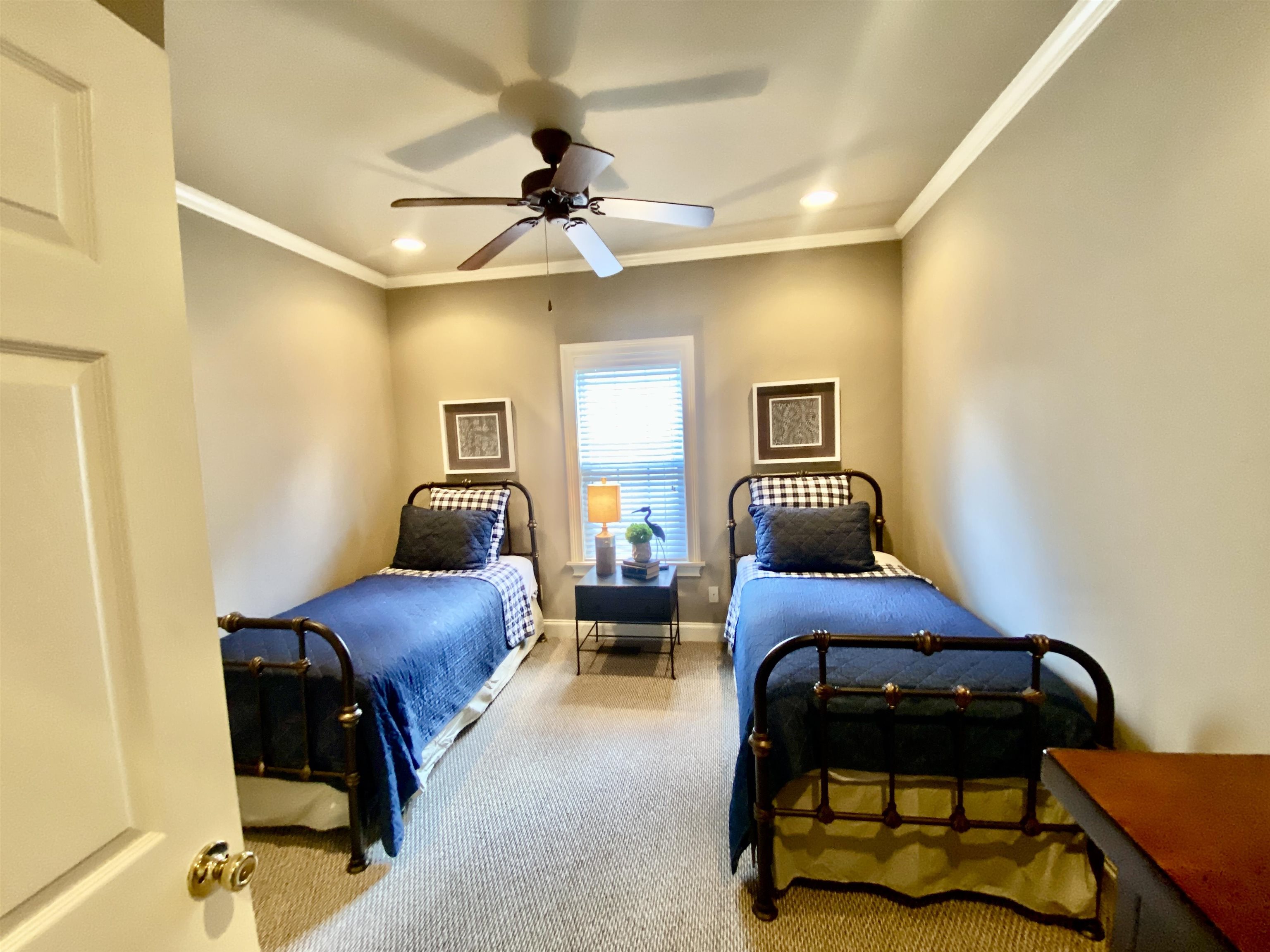 23 Mountain View Iuka, MS 38852 - Photo 24 of 31 a bedroom with a bed and a chandelier