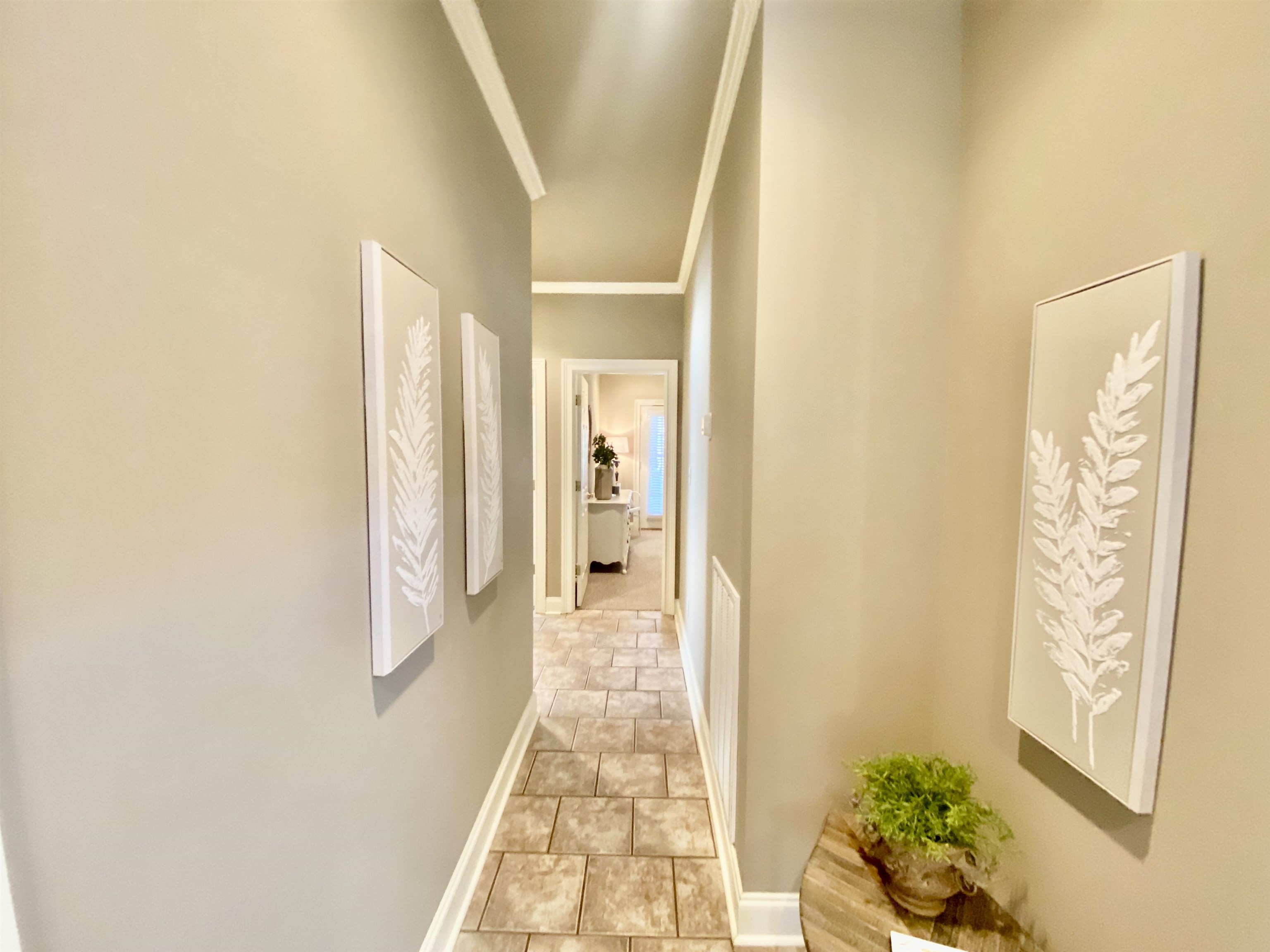 23 Mountain View Iuka, MS 38852 - Photo 27 of 31 a view of a hallway with wooden floor and a bathroom