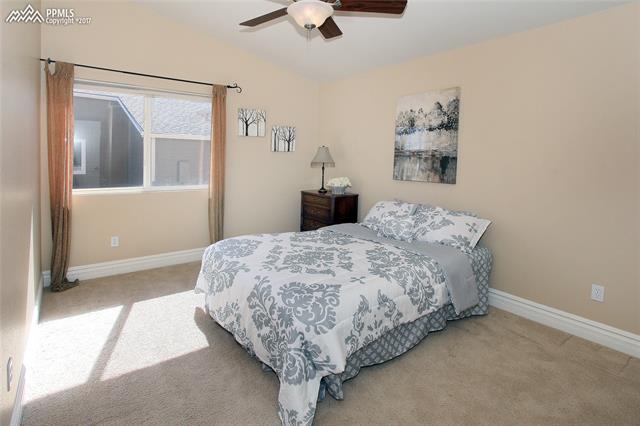 12010 Rio Secco Road Peyton, CO 80831 - Photo 15 of 36 Generous sized 3rd bedroom with vaulted ceilings