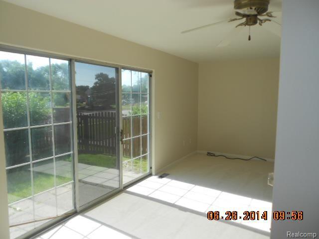 3421 Crooks Road, Unit 1 Royal Oak, MI 48073 - Photo 2 of 8 Livingroom2.jpg