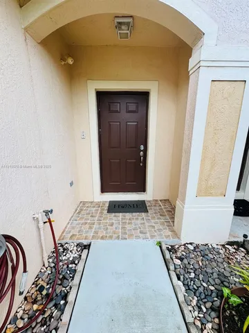 a view of a entryway door of the house