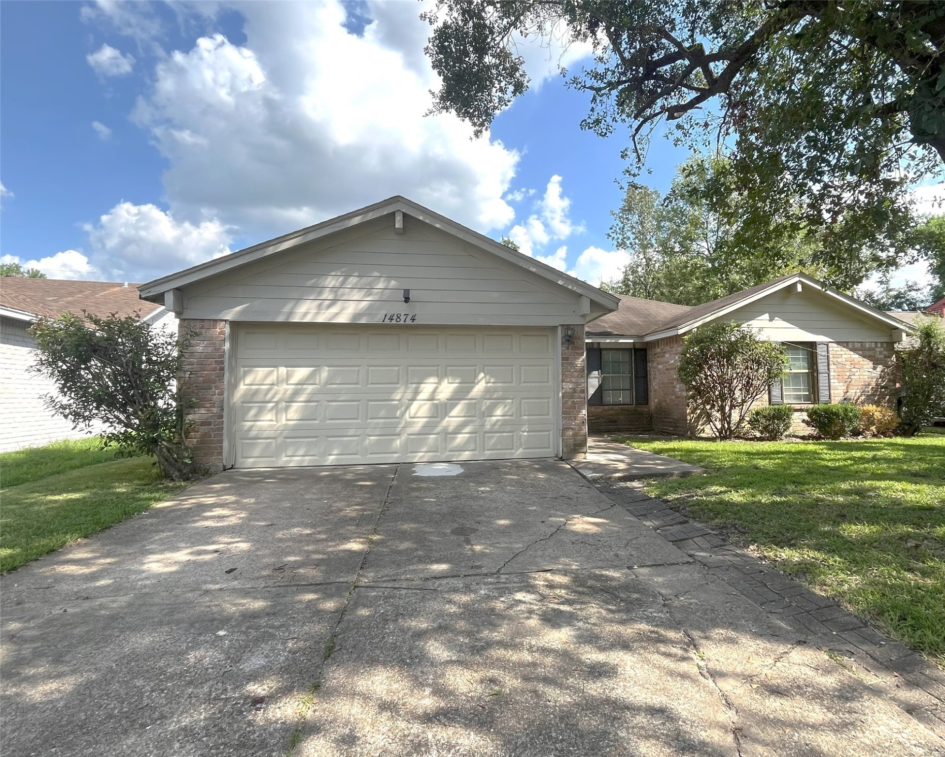 14874 Easingwold Drive Houston, TX 77015 - Photo 1 of 13 a front view of a house with garden