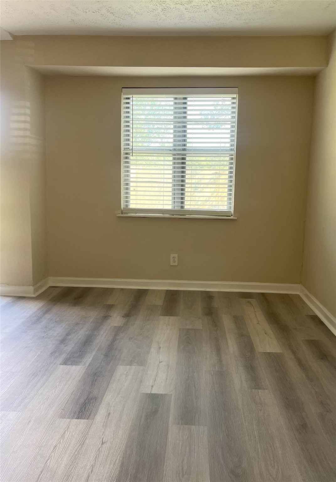 14874 Easingwold Drive Houston, TX 77015 - Photo 5 of 13 a view of a room with wooden floor and a window