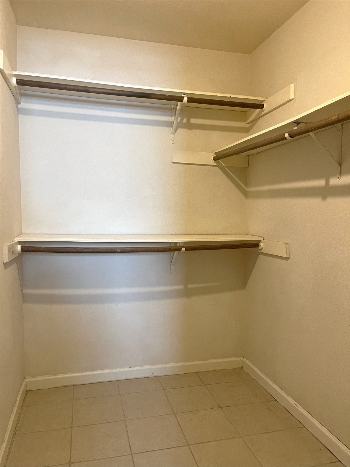 14874 Easingwold Drive Houston, TX 77015 - Photo 8 of 13 a view of a room with racks on the wall