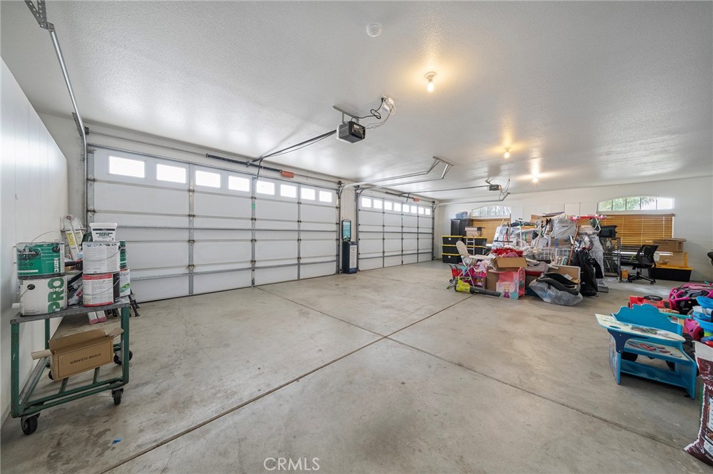 7172 Jargon Road Hesperia, CA 92344 - Photo 26 of 75 a view of a garage with parked cars