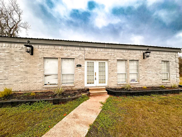 a view of swimming pool with outdoor seating