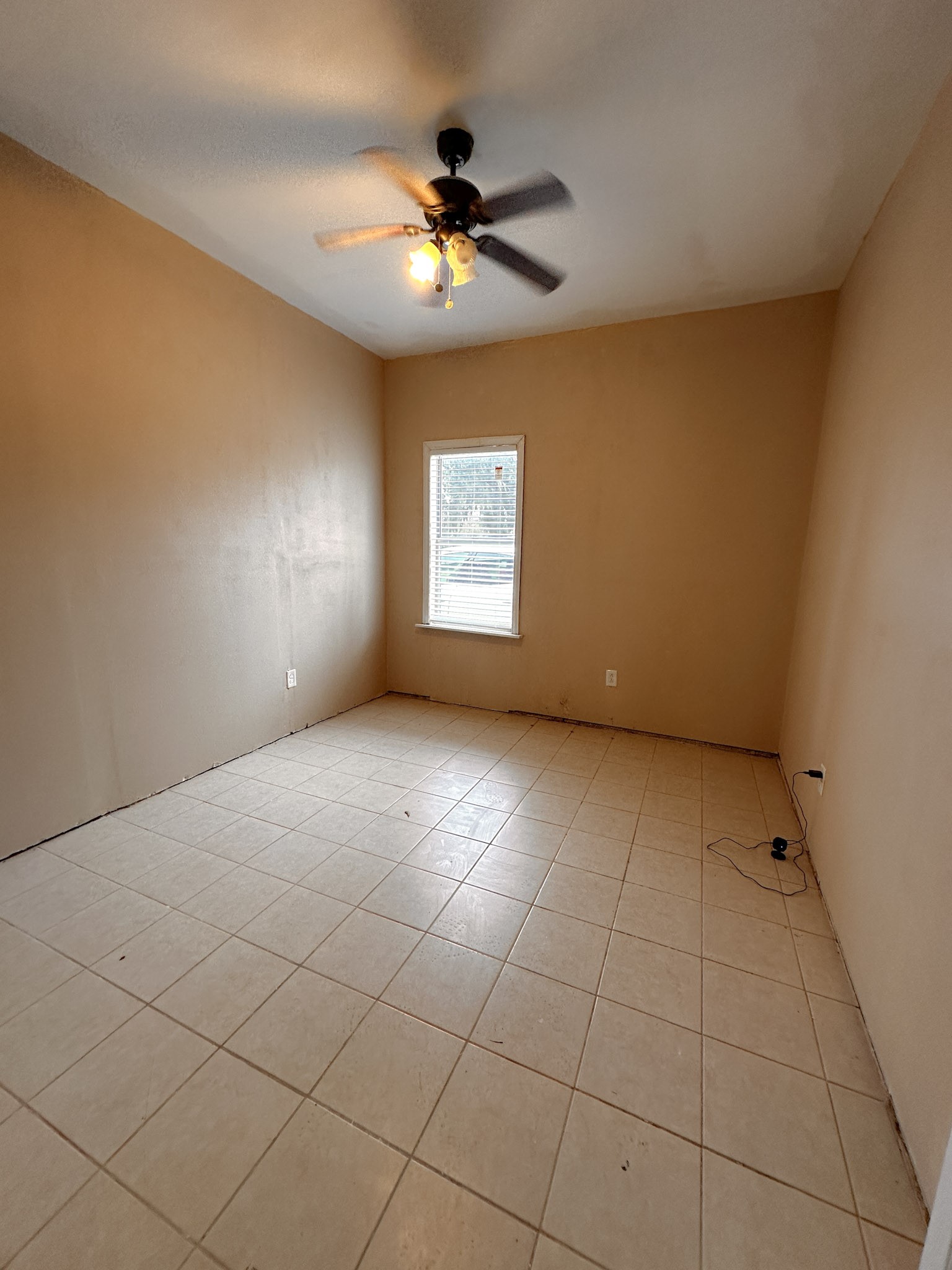 638 Kelly Lane Angleton, TX 77515 - Photo 16 of 21 a view of an empty room with a window