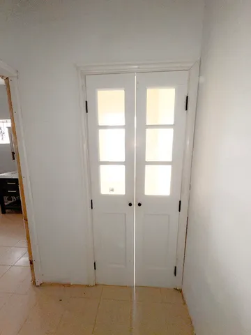 a bathroom with a tub and shower