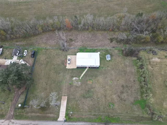 a picture of a bathroom with a shower