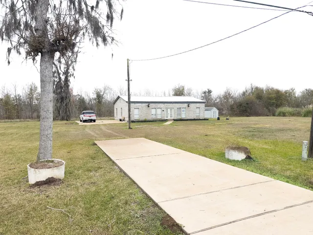 a view of a swimming pool with a lake view