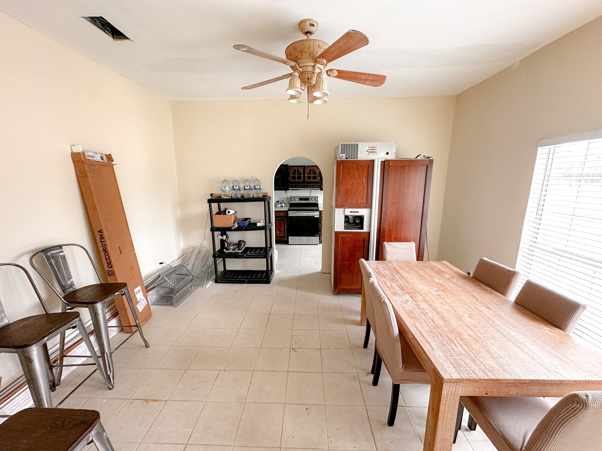 638 Kelly Lane Angleton, TX 77515 - Photo 5 of 21 a view of a dining room with furniture and a chandelier