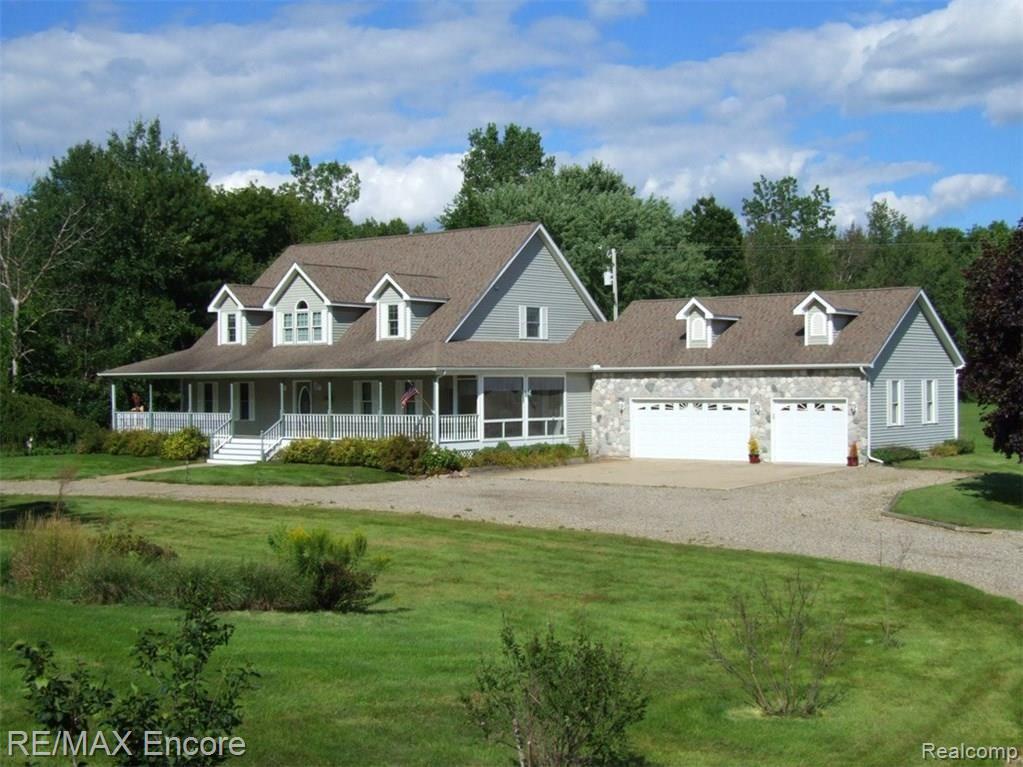 3409 Wynns Mill Road Metamora, MI 48455 - Photo 1 of 31 Sprawling Cape Cod on 3.7 Acres with 3 car heated garage