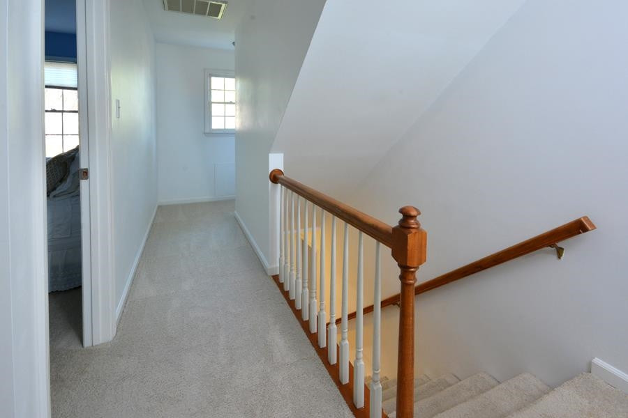 108 Rother Lane Durham, NC 27707 - Photo 29 of 34 a view of a hallway with stairs