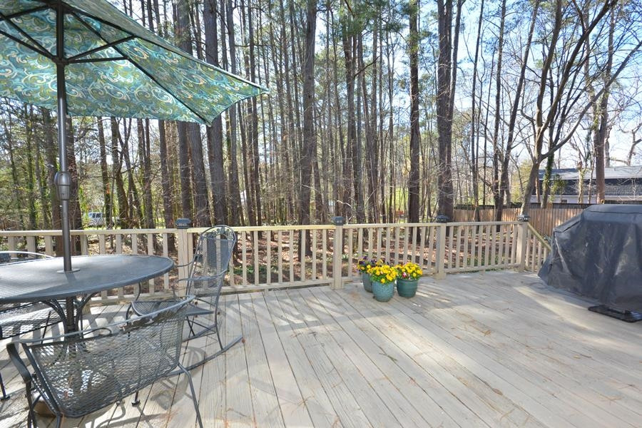 108 Rother Lane Durham, NC 27707 - Photo 30 of 34 a view of outdoor space with deck